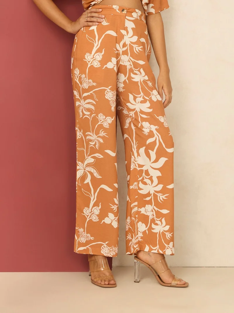 أوجيدر بنطلون مستقيم مطبوع باللون الصدئ